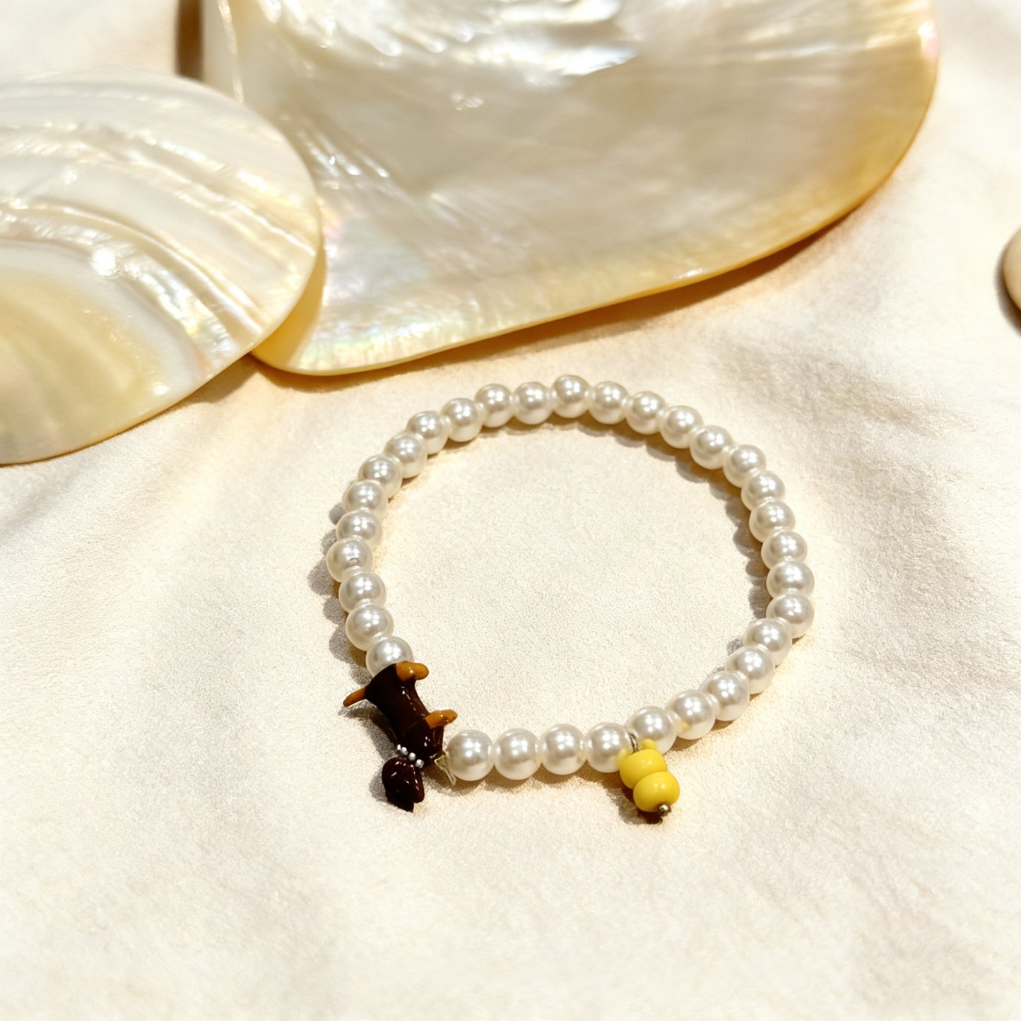 PLAYFUL PEARL PUP BRACELET