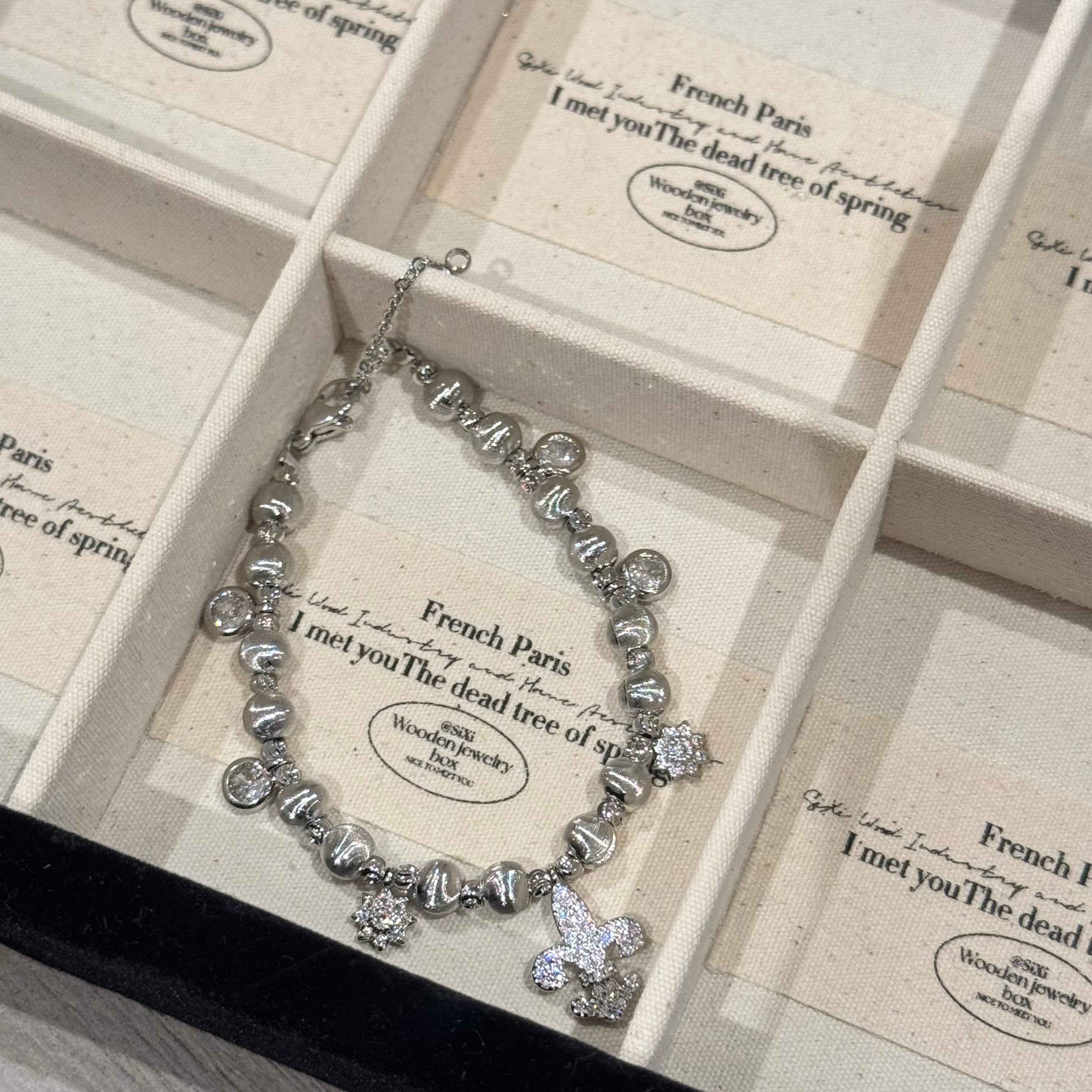 RADIANT CHARM BRACELET